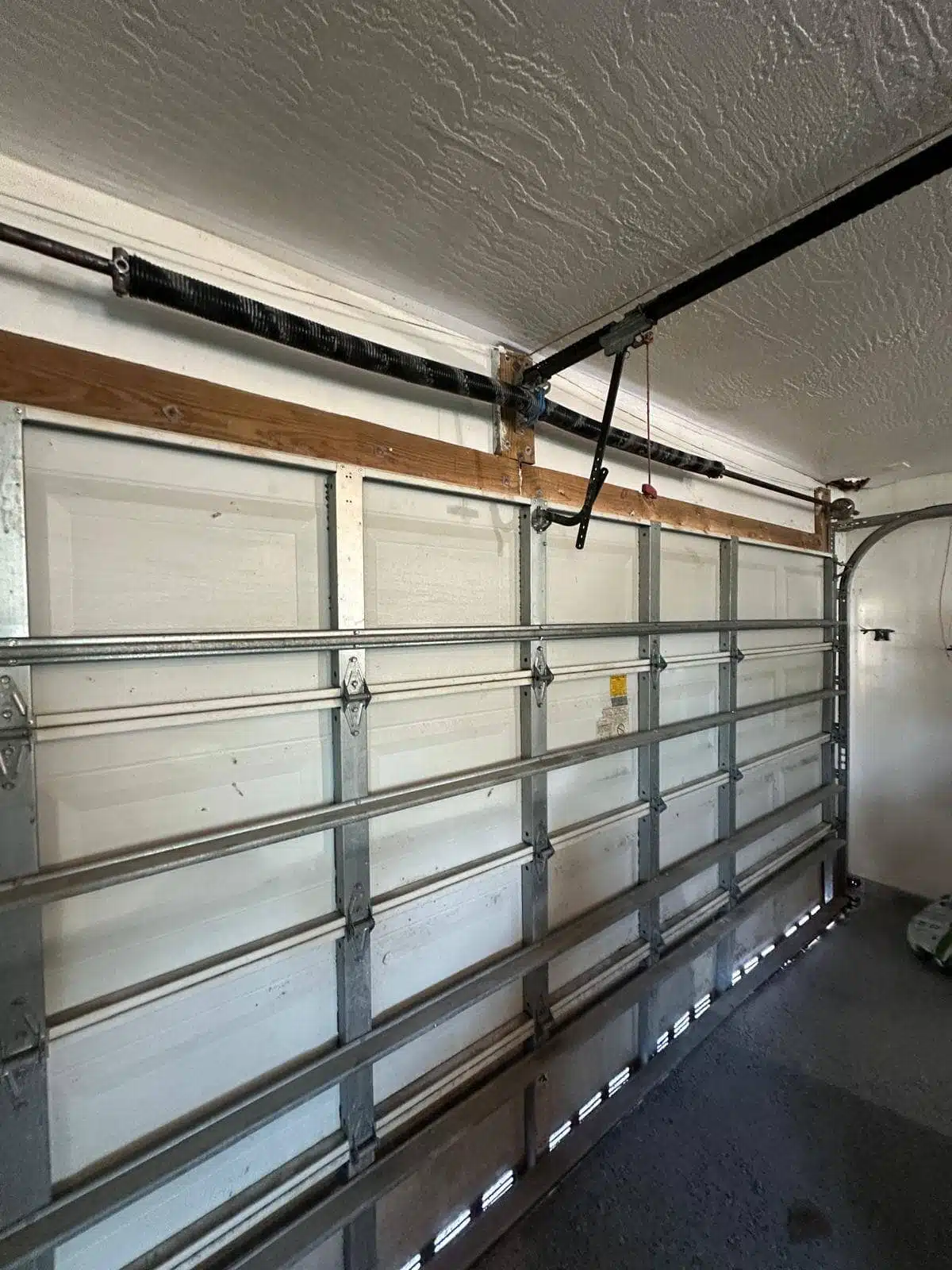 Garage door spring replacement service